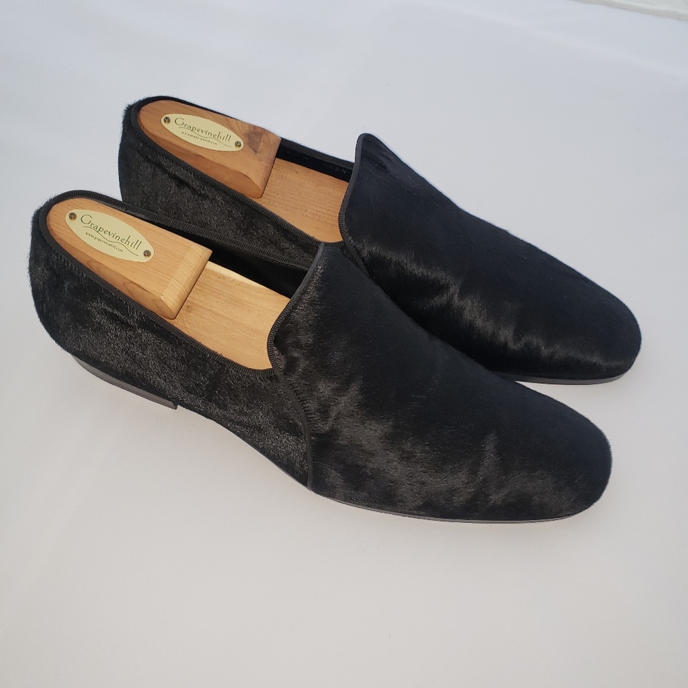 Alexander McQueen black cowhide slip on.